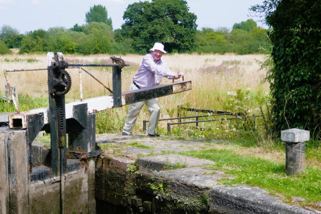 William pushing a canal lock